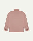 Reverse of dusty pink buttoned organic cotton workshirt from Uskees showing reinforced elbows, tailored cuffs and boxy silhouette.