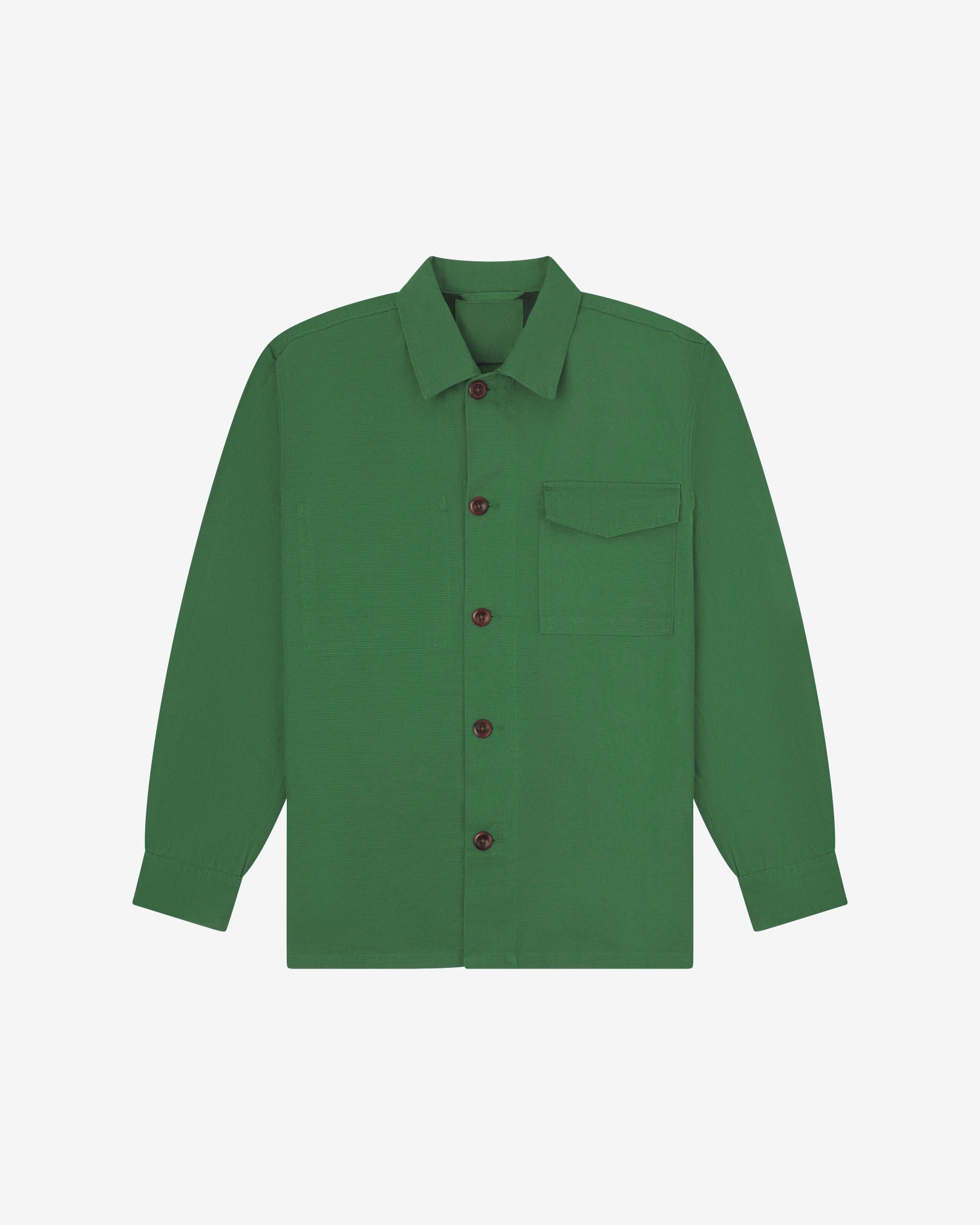 Mint green buttoned organic cotton workshirt from Uskees with clear view of chest pocket and utilitarian silhouette.