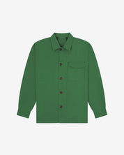 Mint green buttoned organic cotton workshirt from Uskees with clear view of chest pocket and utilitarian silhouette.