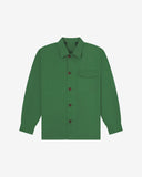Mint green buttoned organic cotton workshirt from Uskees with clear view of chest pocket and utilitarian silhouette.