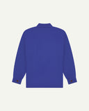Reverse of ultra blue buttoned organic cotton workshirt from Uskees showing reinforced elbows, tailored cuffs and boxy silhouette.