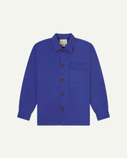 Ultra blue buttoned organic cotton workshirt from Uskees with clear view of chest pocket and Uskees branding label.