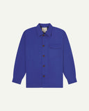 Ultra blue buttoned organic cotton workshirt from Uskees with clear view of chest pocket and Uskees branding label.