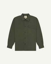 Vine green buttoned organic cotton workshirt from Uskees with clear view of chest pocket and Uskees branding label.