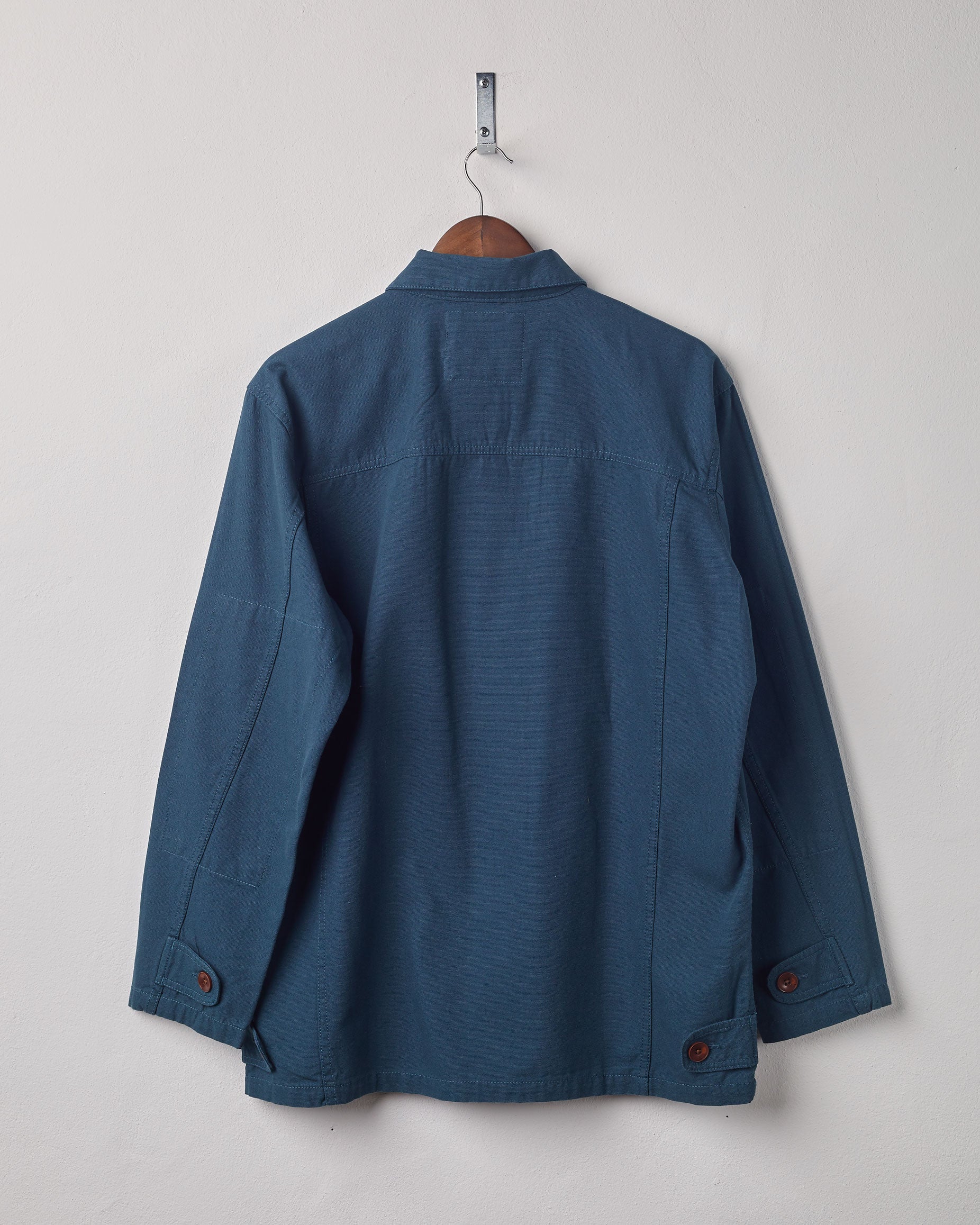 Full-length rear view of #3004 peacock button-down jacket showing reinforced elbows.