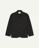 Flat front view of organic cotton black blazer with 3 patch pockets from Uskees. Clearly showing corozo buttons and 3 pockets on the front.