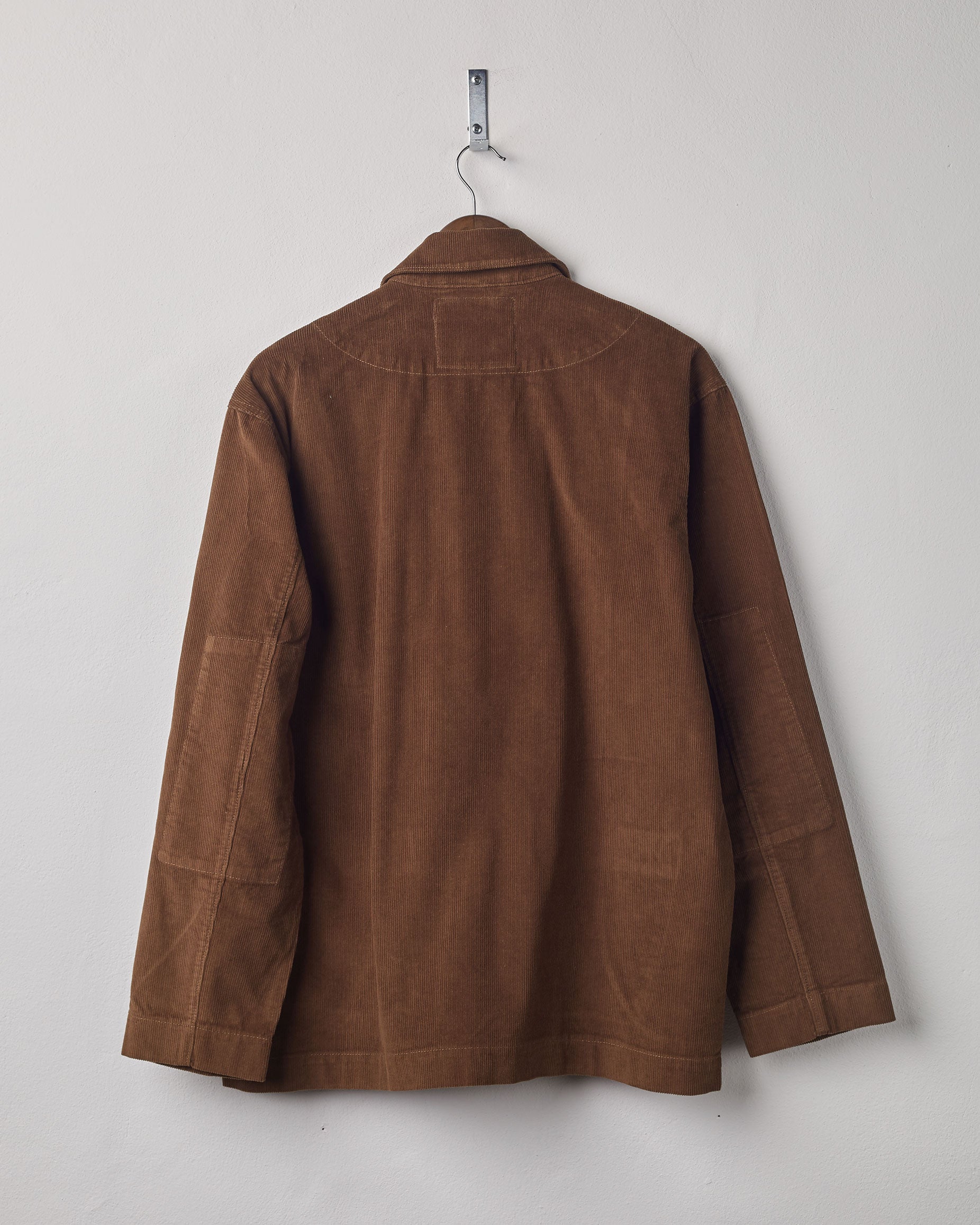 Full-length, rear view of Uskees #3006 blazer in brown corduroy showing reinforced elbows and simple design.