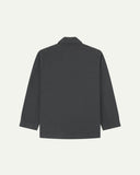 Reverse of charcoal-grey buttoned organic cotton-drill blazer from Uskees showing reinforced elbows and boxy silhouette.
