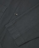 Closer detail view of patch pockets, cuff detailing, corozo buttons and extra durable weave of the organic cotton drill fabric.