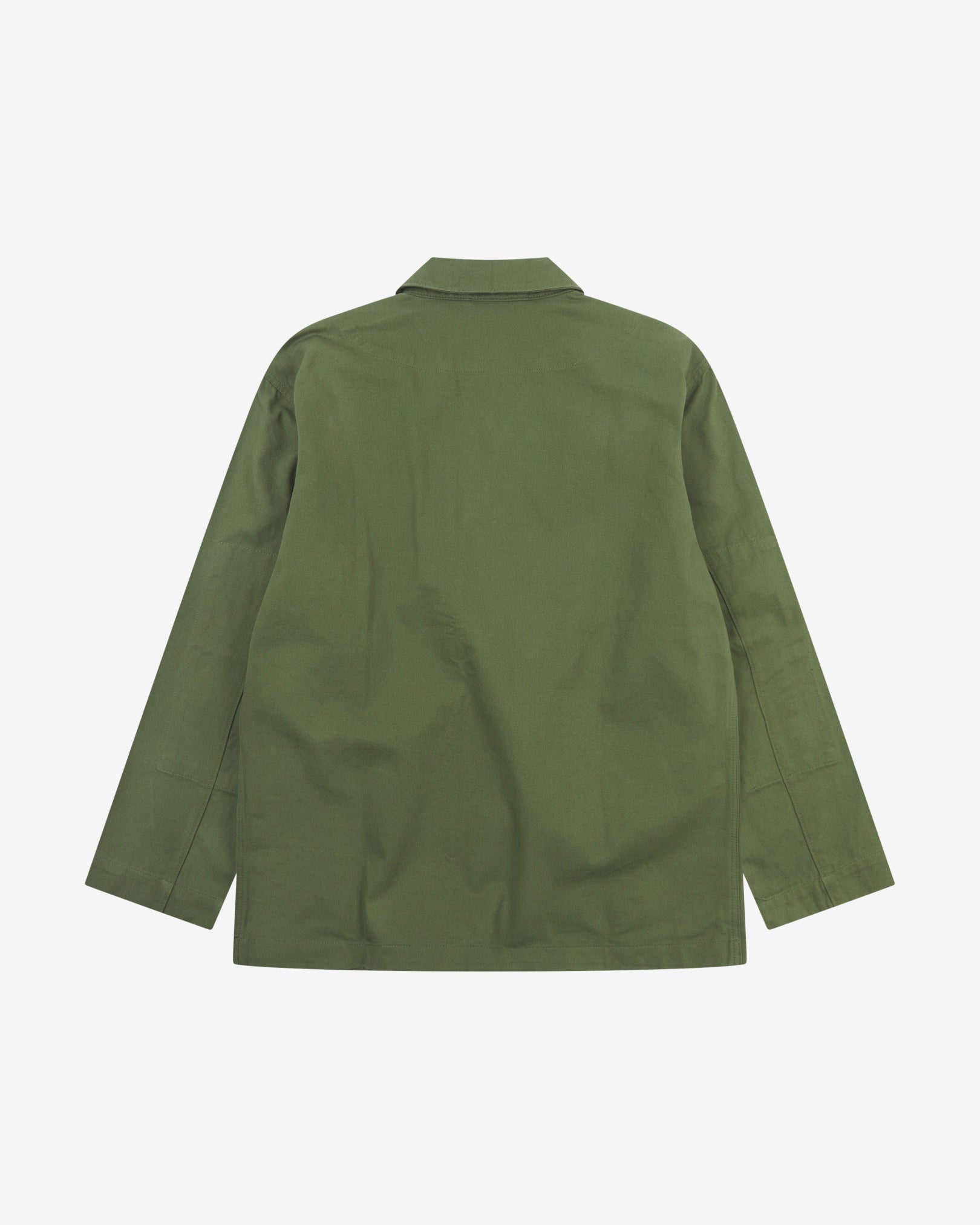Reverse of coriander-green buttoned organic cotton-twill blazer from Uskees showing reinforced elbows and boxy silhouette.
