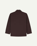 Reverse of burgundy-brown buttoned organic cotton-drill blazer from Uskees showing reinforced elbows and boxy silhouette.