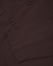 Closer detail view of patch pockets, cuff detailing, corozo buttons and extra durable weave of the organic cotton drill fabric.