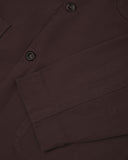 Closer detail view of patch pockets, cuff detailing, corozo buttons and extra durable weave of the organic cotton drill fabric.