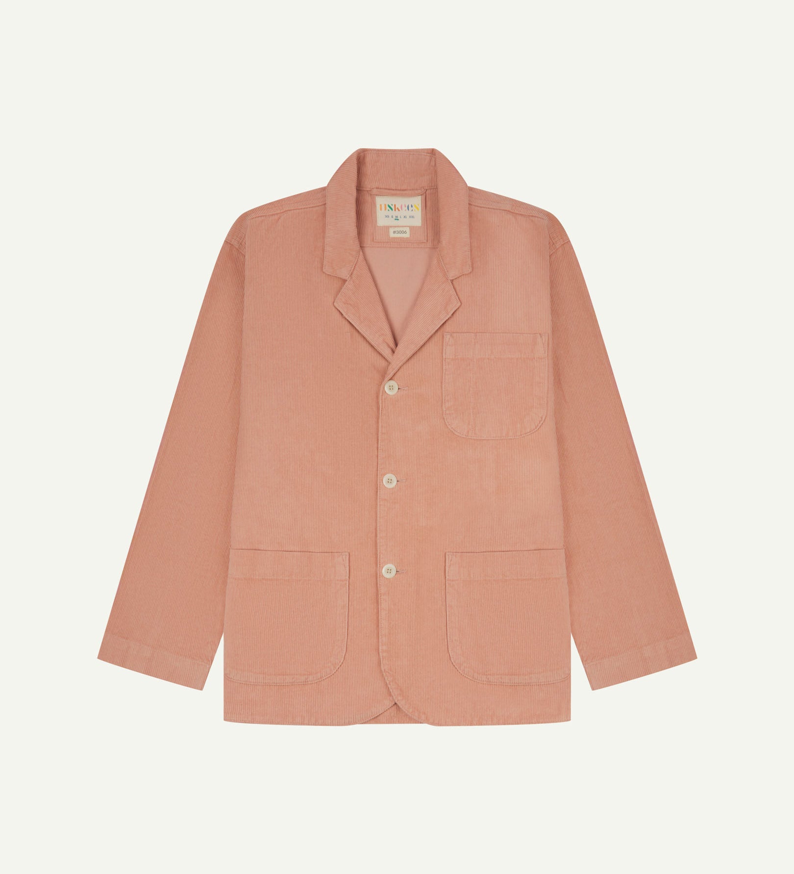 Flat front view of men's corduroy 'dusty pink' blazer with 3 patch pockets from Uskees. Clearly showing corozo buttons and 3 pockets on the front.