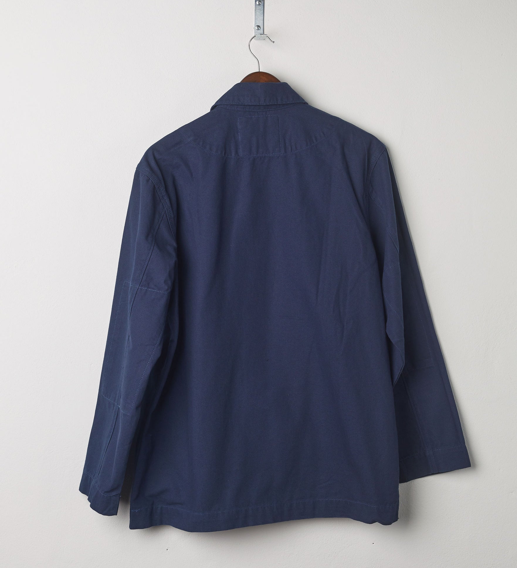 Full-length, rear view of Uskees #3006 navy blazer showing reinforced elbows and simple design.
