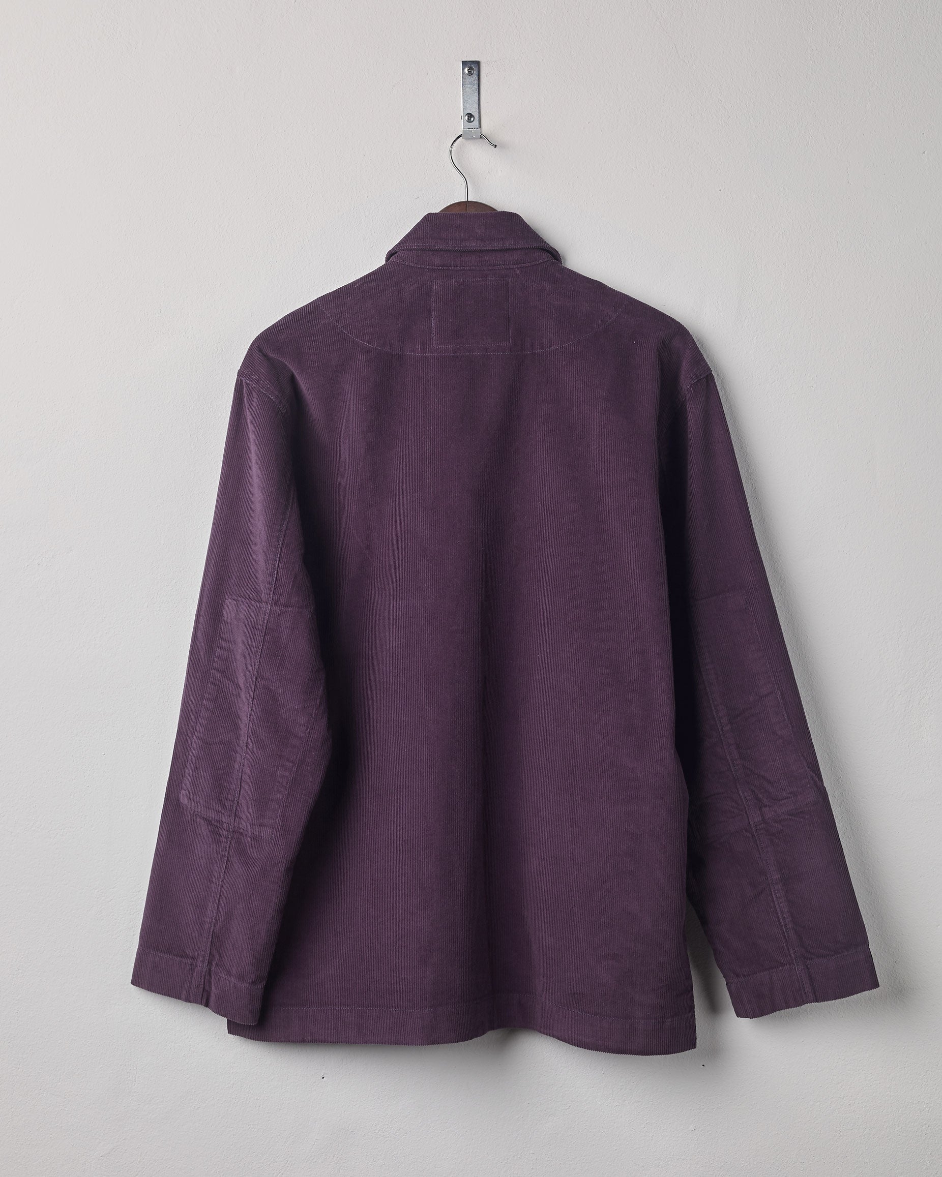 Full-length, rear view of Uskees #3006 blazer in plum corduroy showing reinforced elbows and simple design.