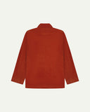Flat back view of corduroy rust-red blazer from Uskees with view of reinforced elbows and indicating contemporary, boxy fit.