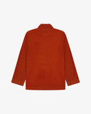 Flat back view of corduroy rust-red blazer from Uskees with view of reinforced elbows and indicating contemporary, boxy fit.