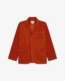 Flat front view of corduroy rust-red blazer with 3 patch pockets from Uskees. Clearly showing corozo buttons and 3 pockets.