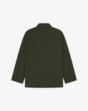 Reverse of vine green buttoned organic cotton-drill blazer from Uskees showing reinforced elbows and boxy silhouette.