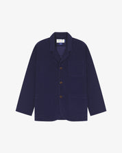 Flat front shot of Uskees dark blue corduroy men's jacket with button details on a white background