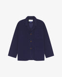 Flat front shot of Uskees dark blue corduroy men's jacket with button details on a white background