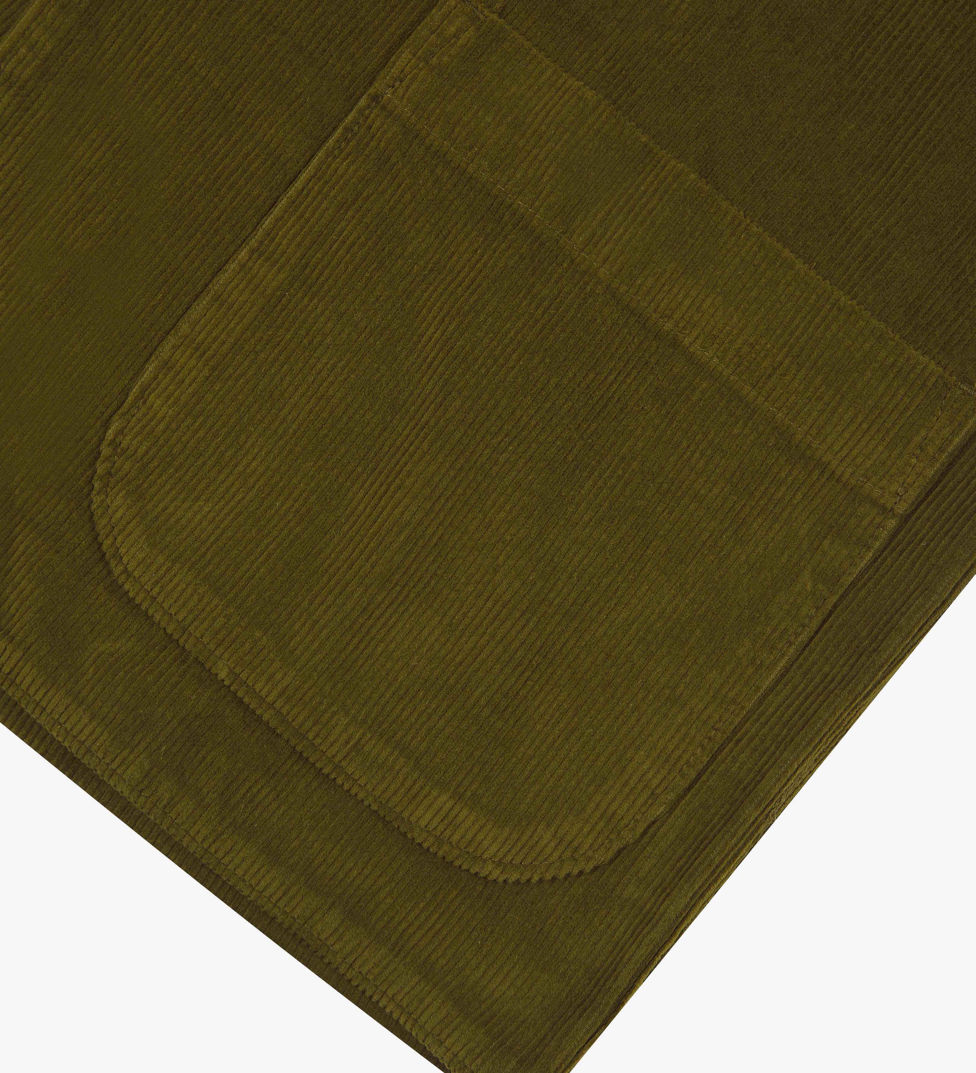 Close-up of an uskees green cord men's blazer showing the pocket  detail on a white background