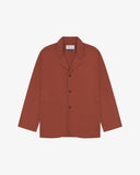 Front flat shot of an Uskees chestnut brown cotton drill men's blazer.