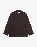 A dark plum colour jacket with a notch lapel, three-button front closure, and four front pockets, displayed flat against a light gray background.