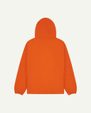 Back flat shot of Uskees gold-orange organic cotton smock showing reinforced elbows, back of hood and loose silhouette.