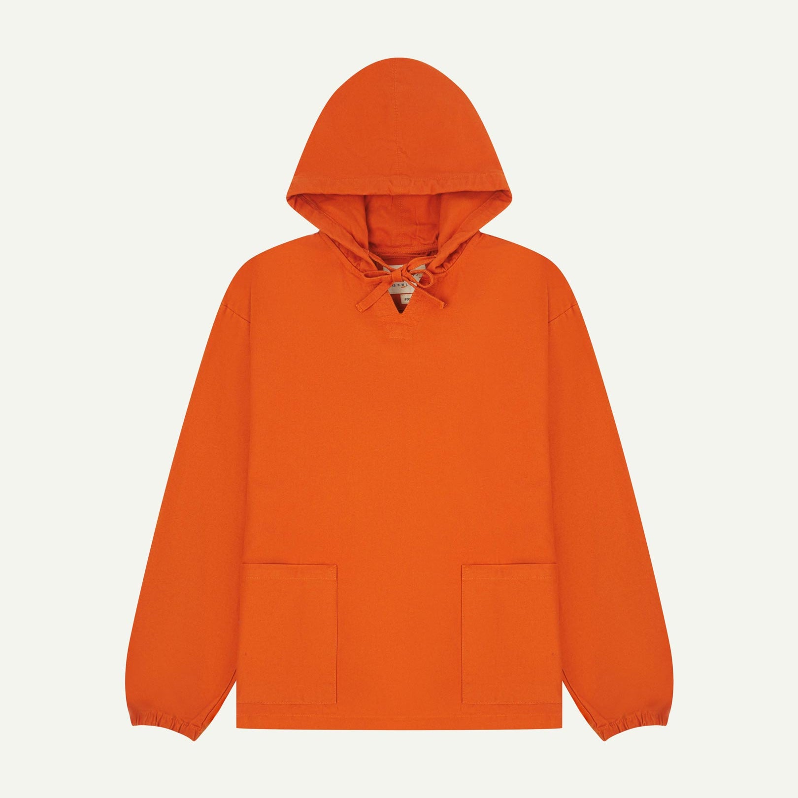 Full-length front flat view of gold-orange smock from Uskees, showing large front hip pockets, drawstring base and hood.