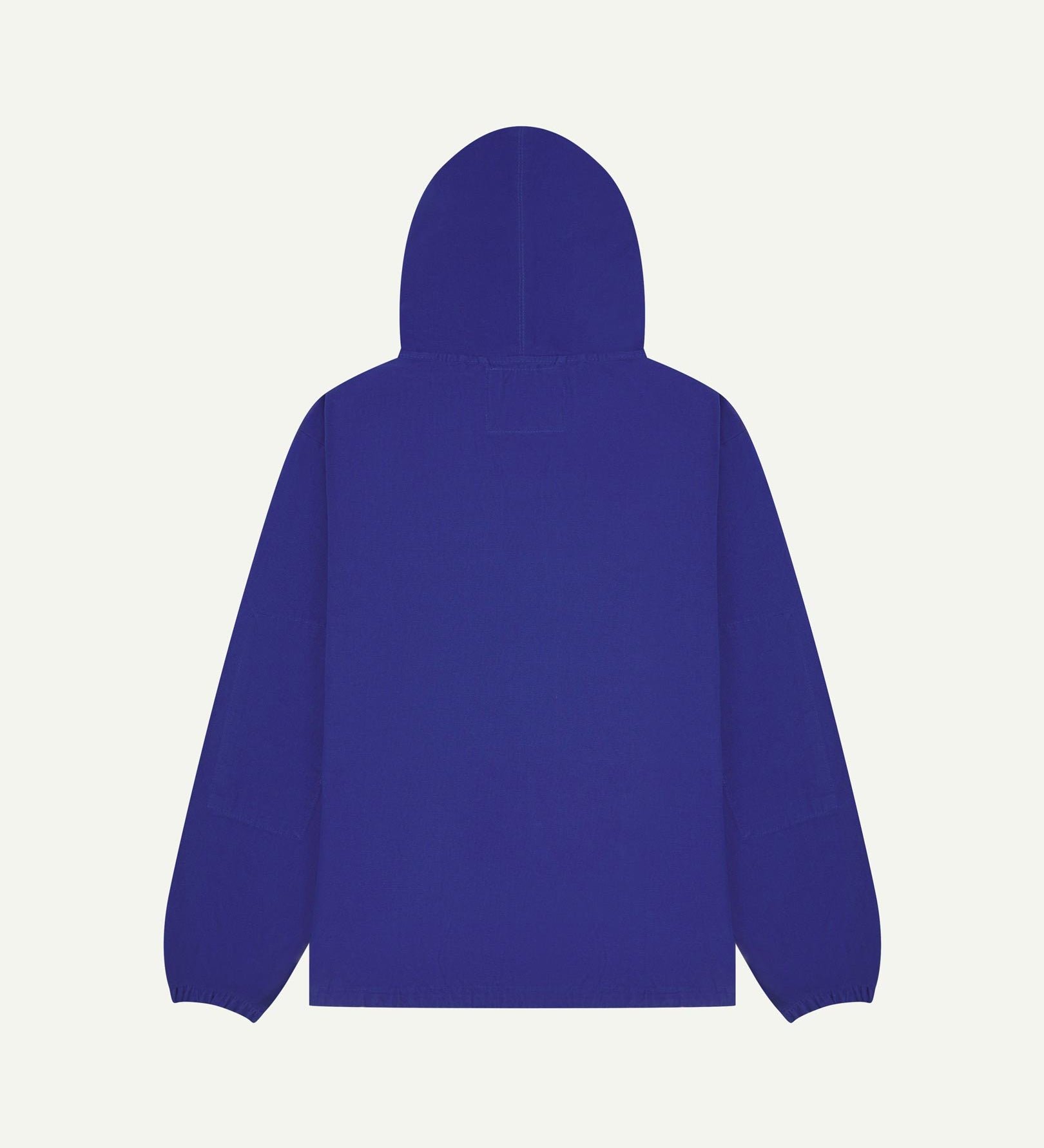 Back flat shot of Uskees ultra blue organic cotton smock showing reinforced elbows, back of hood and loose silhouette.