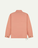 Full back view of Uskees pink-orange (coral) organic cotton coach jacket showing reinforced elbows and simple design.