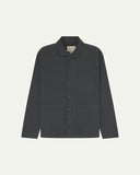 Front view of charcoal-grey organic cotton drill commuter blazer with patch pockets and view of Uskees branding label.