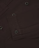 Closer detail view of multiple layered patch pockets, cuff detailing, corozo buttons and extra durable weave of the organic cotton drill fabric.