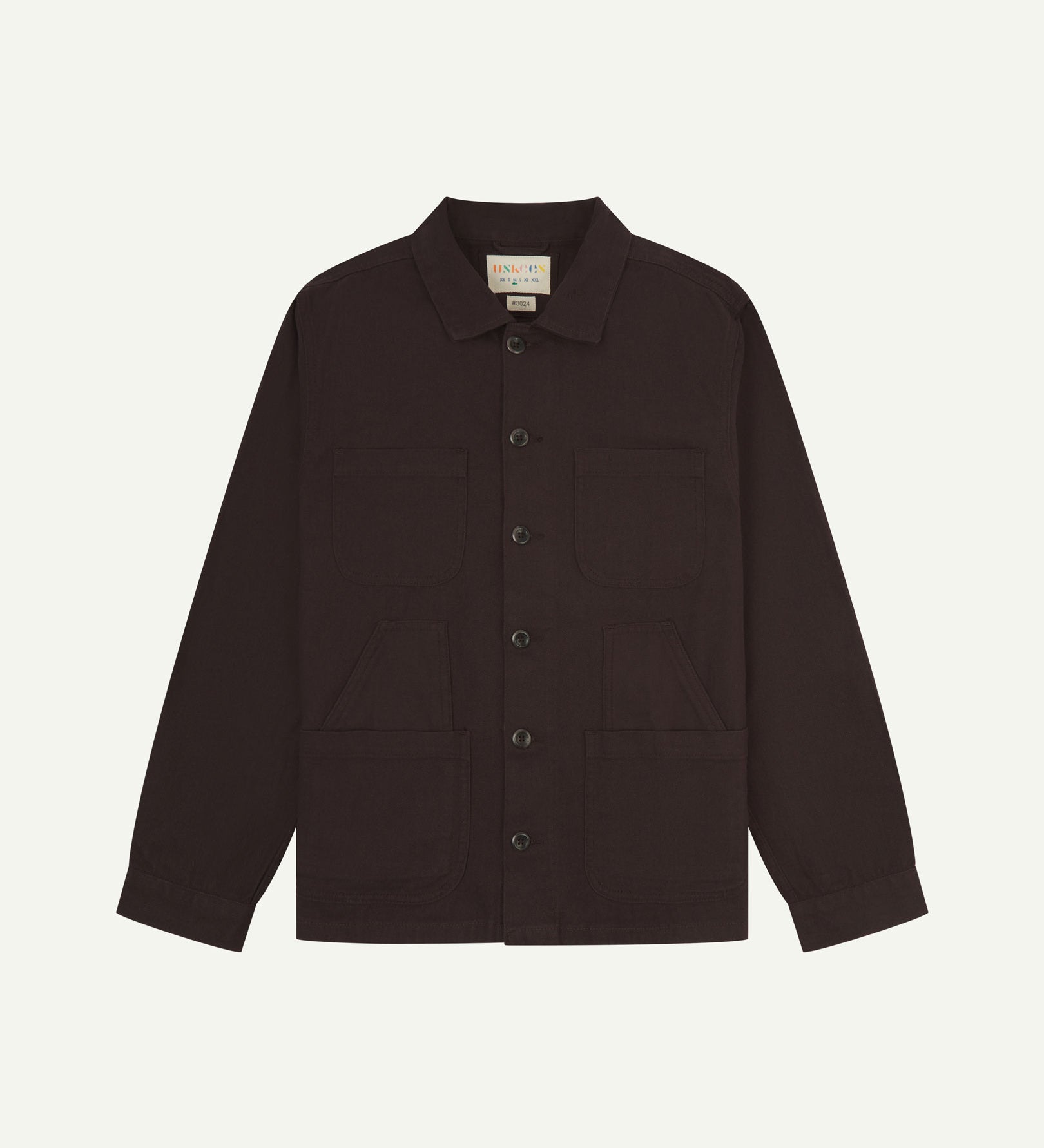Burgundy-brown buttoned organic cotton-drill overshirt from Uskees with clear view of layered patch pockets, reinforced elbows and Uskees branding label.