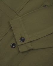 Close up shot of Uskees #3024 drill overshirt in moss showing cuff detail