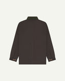 Back flat shot of Uskees cotton canvas chore jacket in charcoal-grey with a green collar. Clear view of the double buttoned cuffs.