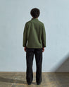 Full-length rear view of #3027, coriander-coloured organic canvas over shirt with reinforced elbows.