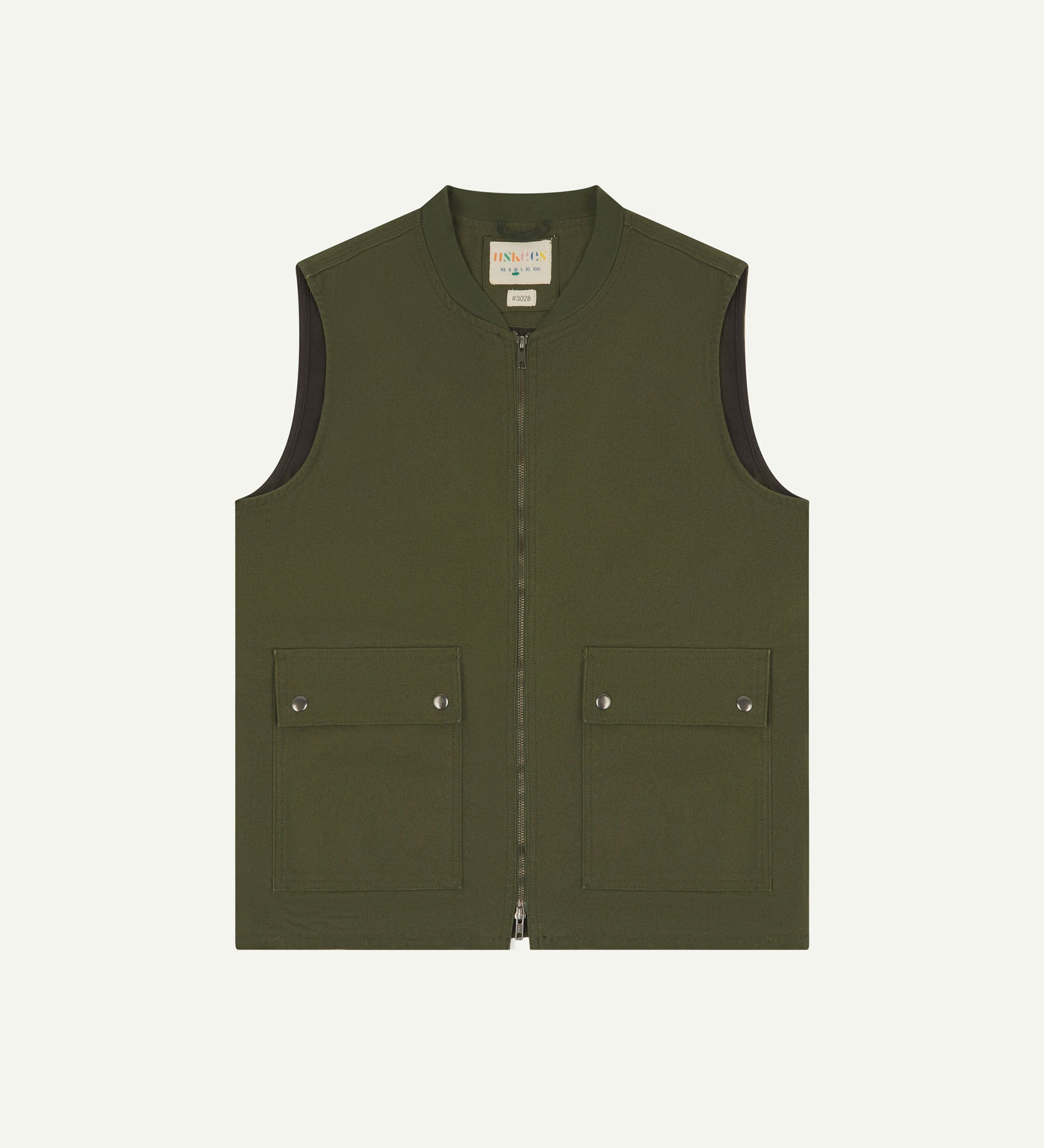 Front flat shot of Uskees coriander-green gilet-type zip front waistcoat showing the front flap pockets and inner brand label at neck.