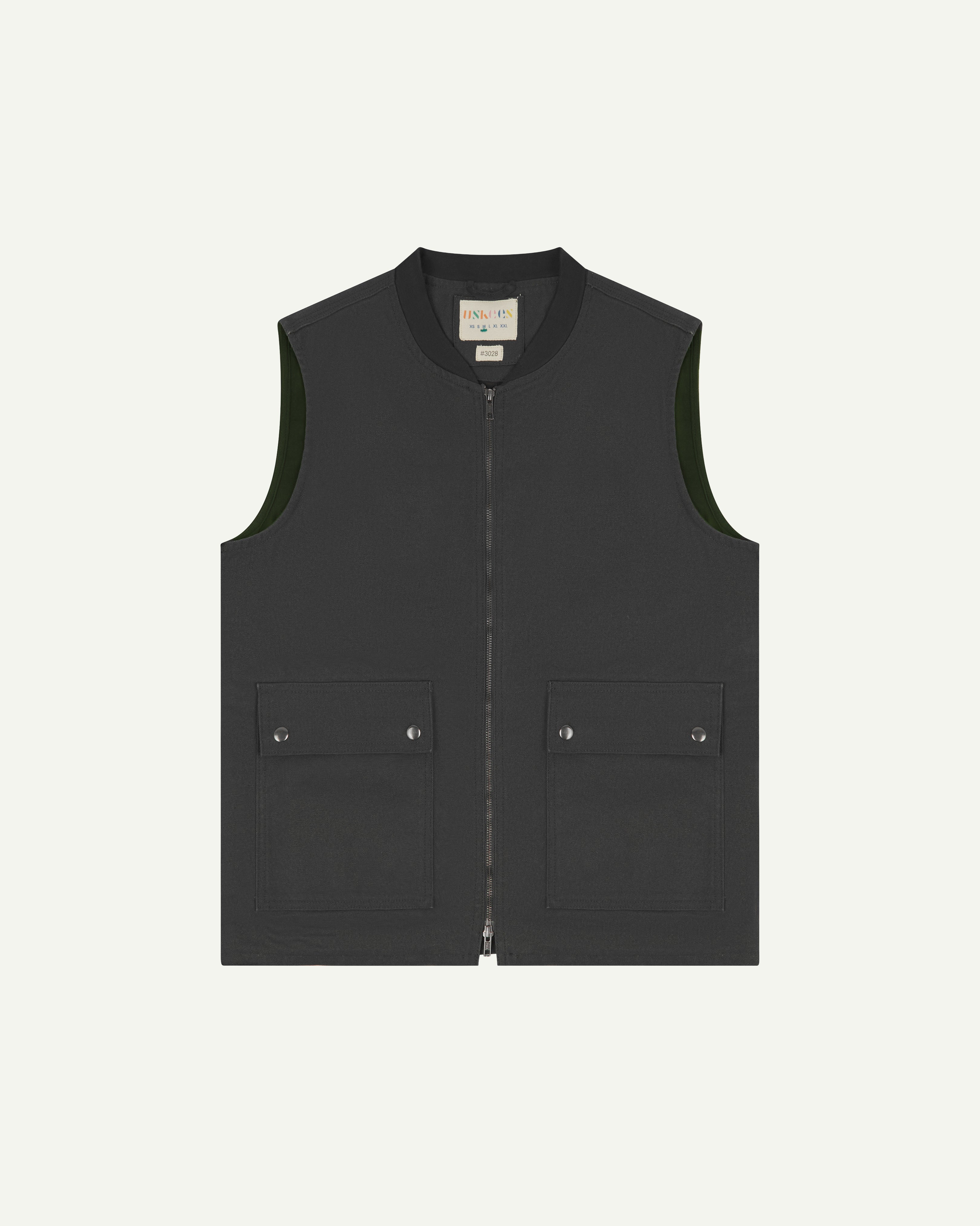 front flat shot of uskees dark grey  zip-front vest waistcoat showing the patch pockets and inner brand label at neck