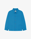 Full front view of Uskees opal-blue organic herringbone cotton engineer jacket with 2 deep hip pockets with internal ticket pocket and chest pocket.