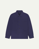 Flat front view of Uskees deep indigo organic herringbone cotton engineer jacket with 2 deep hip pockets with internal ticket pocket and chest pocket.