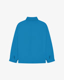 Full back view of Uskees opal-blue organic herringbone cotton engineer jacket showing reinforced elbows and simple lines.