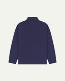 Flat back view of organic cotton deep indigo signal jacket from Uskees with view of reinforced elbows and raglan sleeves.