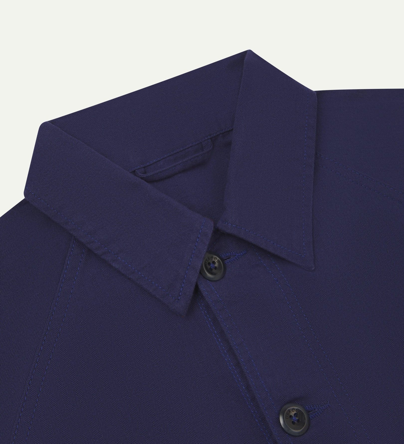 Close-up and angled front view of the 3041 signal jacket showing the herringbone cotton texture, collar and double stitch placket.