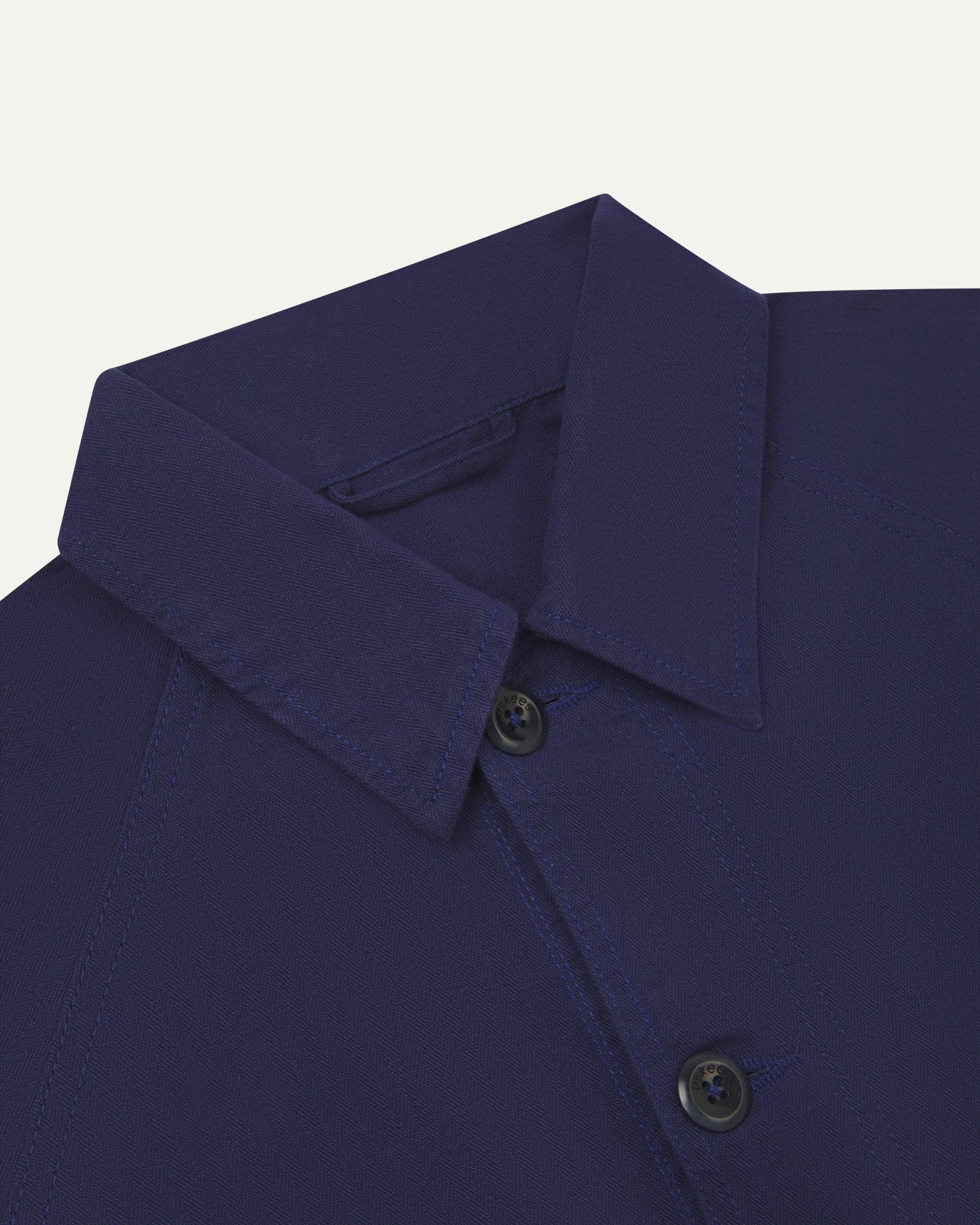 Close-up and angled front view of the 3041 signal jacket showing the herringbone cotton texture, collar and double stitch placket.