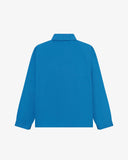 Flat back view of organic cotton opal-blue signal jacket from Uskees with view of reinforced elbows and raglan sleeves.