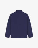 Flat back view of organic cotton deep indigo signal jacket from Uskees with view of reinforced elbows and raglan sleeves.