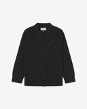 Flat front view of knitted organic cotton black collared cardigan with 3 patch pockets from Uskees. Clearly showing corozo buttons, two branding labels and 3 pockets on the front.